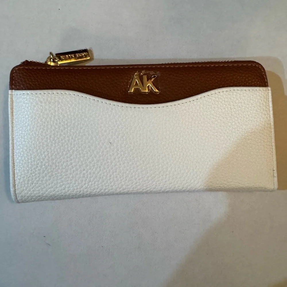 Anne Klein AK Logo Slim Zip Around Wallet in a two-tone Cream and Brown/Saddle